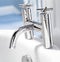 Chrome finish faucet set on bathtub