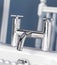 Chrome finish faucet set on bathtub
