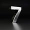 Chrome number 7. 3D render shiny metal font isolated on black background