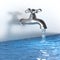 Chrome tap with a water stream