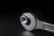 Chrome-Vanadium Spanner Gripping Nut On Black