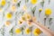 Chrysanthemum and cutter flowers composition. Pattern and Frame made of various yellow or orange flowers and green leaves on white