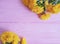 chrysanthemum yellow flower celebration on pink wooden frame background