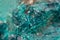 Chrysocolla is a hydrated copper cyclosilicate