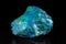 Chrysocolla mineral stone in front of black