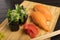 Chukka gunkan seaweed rolls and salmon sushi on a bamboo packing board