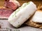 Chunks of salted lard background, spices and herbs, Homemade glazed smoked ham and jerky meat with fresh natural herbs and