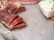 Chunks of salted lard background, spices and herbs, Homemade glazed smoked ham and jerky meat with fresh natural herbs and