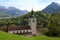 Church and Alps mountains, Gruyeres, Switzerland