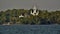 Church amidst coconut trees near backwaters