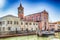 Church and ancient sailboats on Canal Port