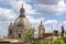 Church baroque dome and clouds in Rome