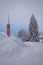 Church behind a heap of snow in Buchs in Switzerland 15.1.2021