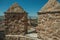 Church belfry amid roofs seen from crenel in a wall at Avila