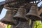Church bell. Several metal Church bells. Bell ringing. Selective focus