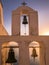 Church Bell Tower at Sunset in Santorini, Greece