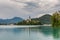 Church on the Bled lake island. Dark gray sky after storm .