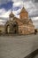Church of the blessed Holy Virgin and bell tower rotunda in the courtyard of the fortress Khor Virap against the sky with rain clo