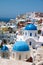 Church with blue cupola on Santorini island