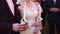 The church, the bride and groom hold candles on the wedding