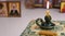Church candle in green candlestick near icons ,orthodox faith