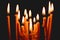 church candles glowing in the dark create a spiritual atmosphere