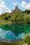 Church in Cetina with reflection in beautiful turq