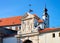 Church clock tower and entrance gate in Ptuj Castle Slovenia