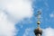 Church cross close up against a blue sky. The concept of the Orthodox religion and Christianity