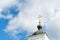 Church cross close up against a blue sky. The concept of the Orthodox religion and Christianity