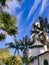 Church and Daytime Moon with Palm Trees