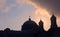 Church dome and christian crosses silhouetted against the afternoon sky in Istambul, Turkey