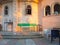 Church exterior. Church courtyard. Architecture of Georgia. Benches next to the temple