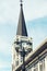 Church exterior and steeple cross., Historic church.