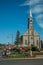 Church facade and people in a street of Gramado