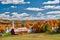 Church and farm with red barn at autumn