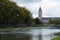 Church of Gulpen with arch fountains in the village pond