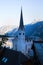 Church in Hallstatt at sunset. Austrian Alps.