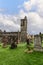 The Church of the Holy Rude venerable tower vigil over weathered gravestones in its historic Stirling cemetery