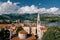 Church of the Holy Trinity near St. John Cathedral among old houses with red roofs. Budva, Montenegro