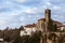 Church and houses on the Natisone river in Cividale del Friuli. on a cloudy day.