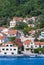 Church and houses with red title roofes. Kamenari is located in Strait of Verige - the narrowest part of Bay of Kotor.