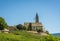 The Church of the idyllic village of Cortaccia. Cortaccia extends on the sunny side of the wine road. South Tyrol, Italy.