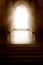 Church Interior. Window Light in Dark Inside Room. Shining Door in front Empty Steps. Mystery Background