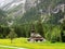 Church at Kandersteg, Switzerland, backed by mountains and waterfalls