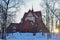 Church of Kiruna in winter during sunset. Kiruna church and is one of Sweden's largest wooden church buildings.