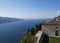 Church Madonna di Montecastello in Tignale on vast lake Garda with scenic Italian Alps in background, Lombardy, Northern Italy