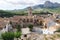 Church and main square of Polop de Marina with mountainrange, Costa Blanca, Spain