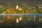 The Church of Mary the Queen on the small island in the middle of Lake Bled in autumn.