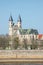 Church and monastery of Our Ladies at early Spring in historical downtown and city center of Magdeburg, Germany, sunny day, blue